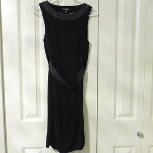 BEBE Black T-back mini dress with faux leather belt and trim